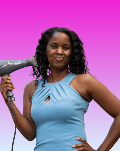 A Ripple Room member with a hair dryer